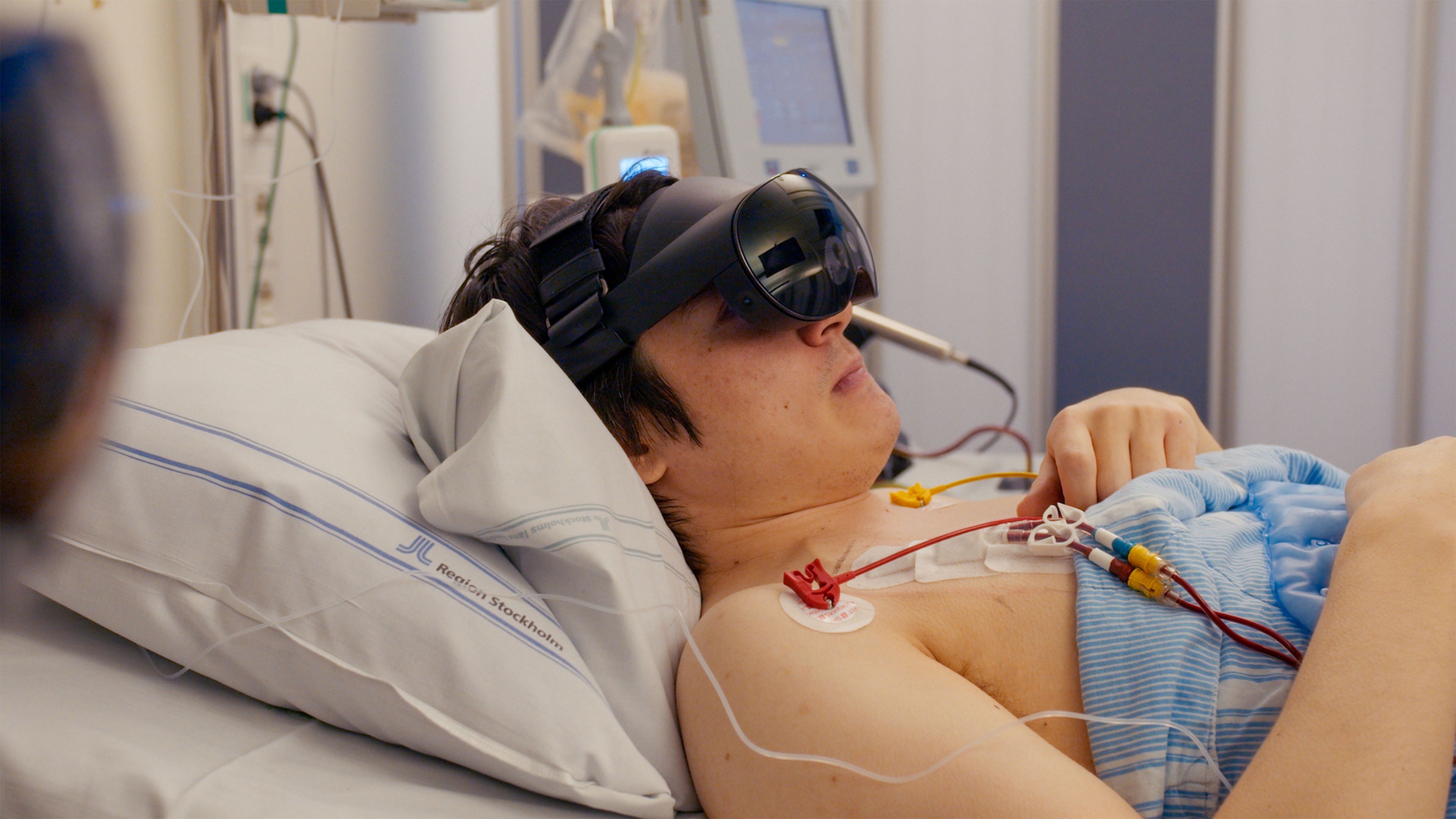 blurry photo of sunset over ocean with logo on top